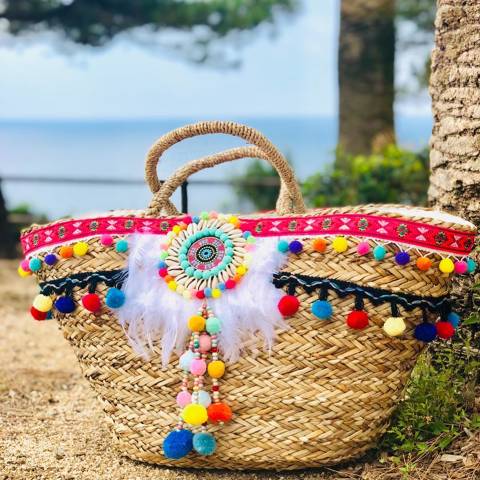 Raffia fethers Bag